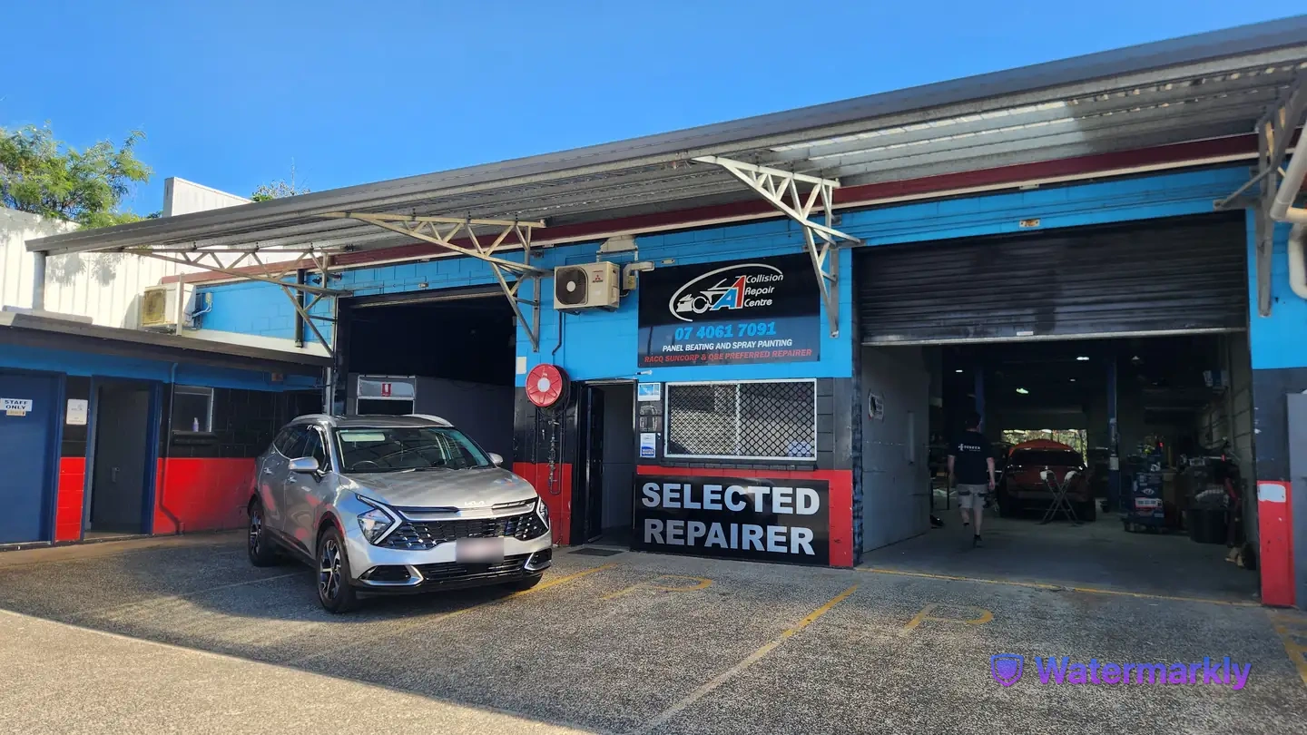 Panel beating workshop interior at A1 Collision Repair Centre in Innisfail